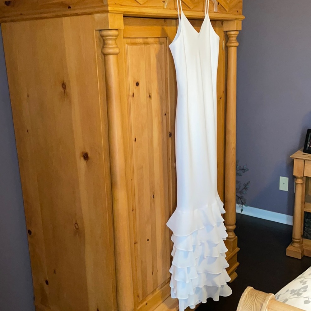 Custom-madeFits size 4/6. Worn on a 5’4” female.